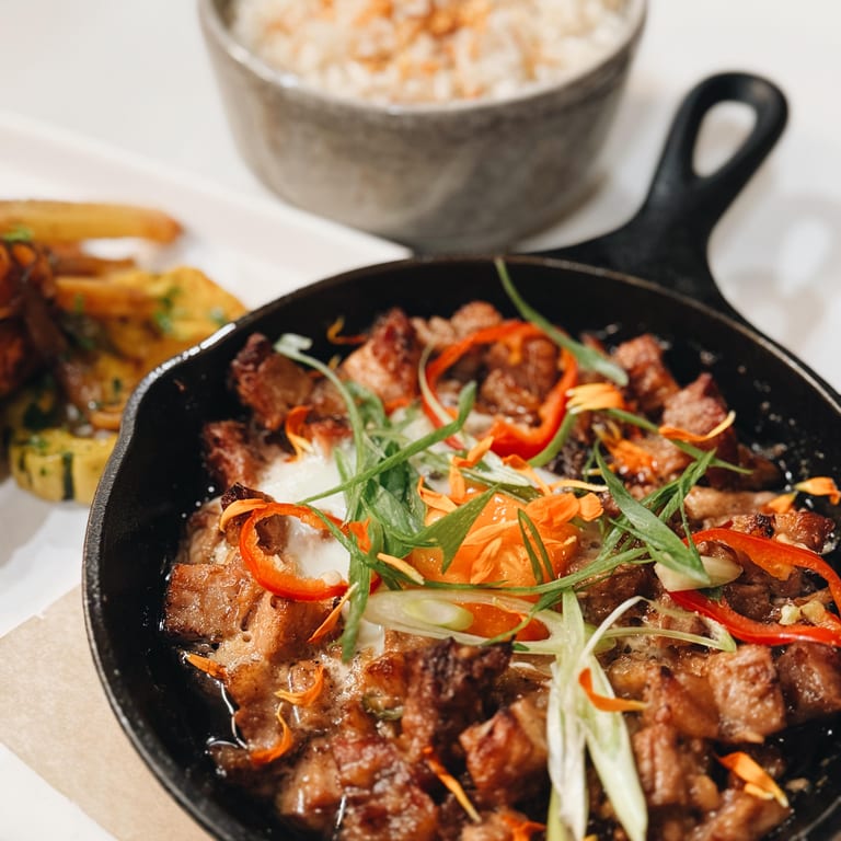 Sizzling Sisig: A Filipino Fusion Favorite